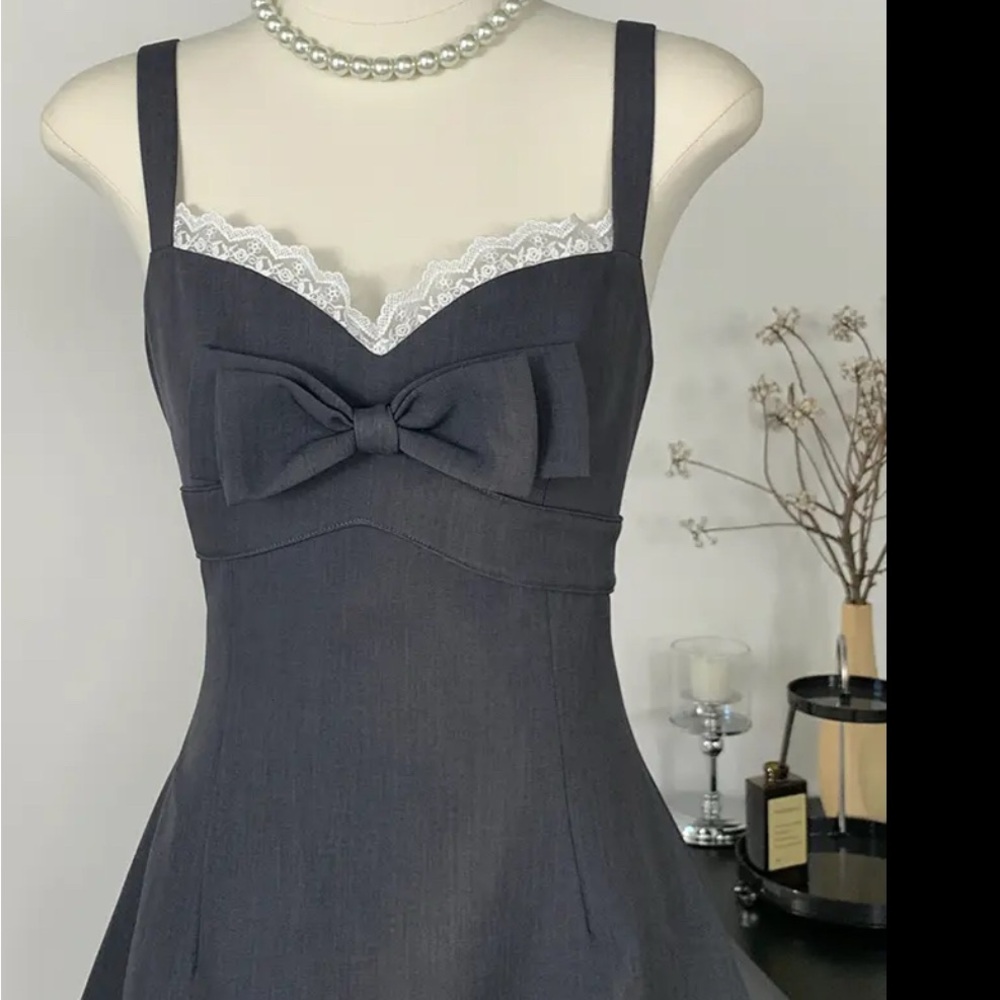 Elegant Black Dress with Bow Detail
